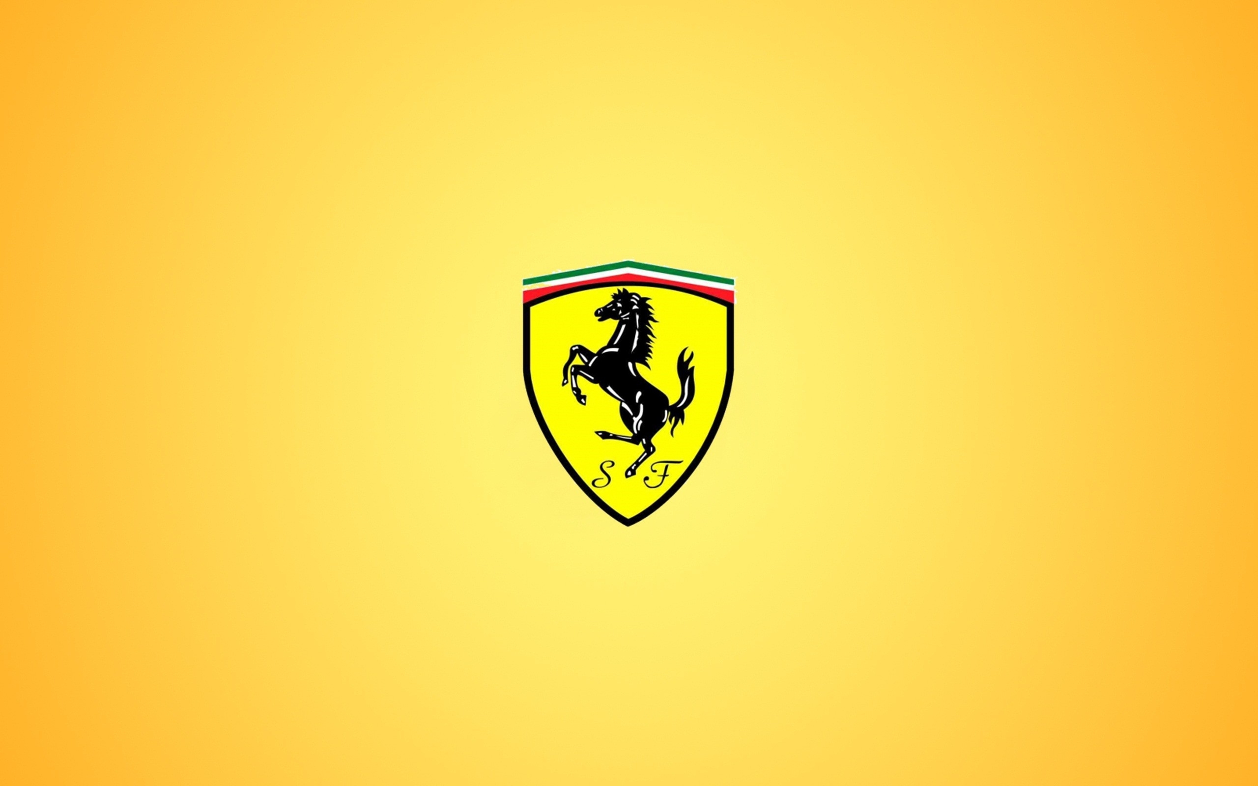 Желтые лого. Феррари лого. Желтый логотип. Ferrari обои. Логотип на желтом фоне.